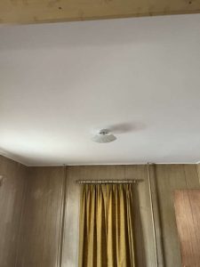 After: Living room ceiling repaired.